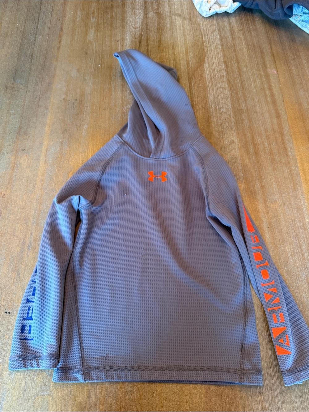 Under Armour Gray Long Sleeve Hoodie with Orange Logo and Sleeve Text